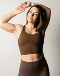 TOP DEPORTIVO MARRON CROSSTRAINING RITE - PERFORMANCE